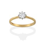 An 18 Carat Gold Diamond Solitaire Ring, the round brilliant cut diamond in a white claw setting