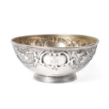A Victorian Silver Bowl, by William Kerr Reid, London, 1854, chased with a wide border of C scrolls,