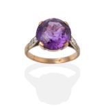 A Synthetic Sapphire Ring, the round brilliant cut synthetic sapphire simulating alexandrite in