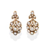 A Pair of Floral Drop Earrings, the floral and foliate drops of pierced mounts inset with round