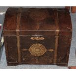 A brown leather and gilt tooled cabinet, in the form of a dome top trunk, with hinged lid