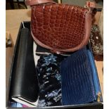 A group of assorted accessories, comprising a Bugatti cream and black leather clutch bag, a Loewe