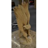 A carved wooden eagle