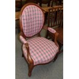 A 19th century walnut framed open armchair, recovered in pink tartan fabric