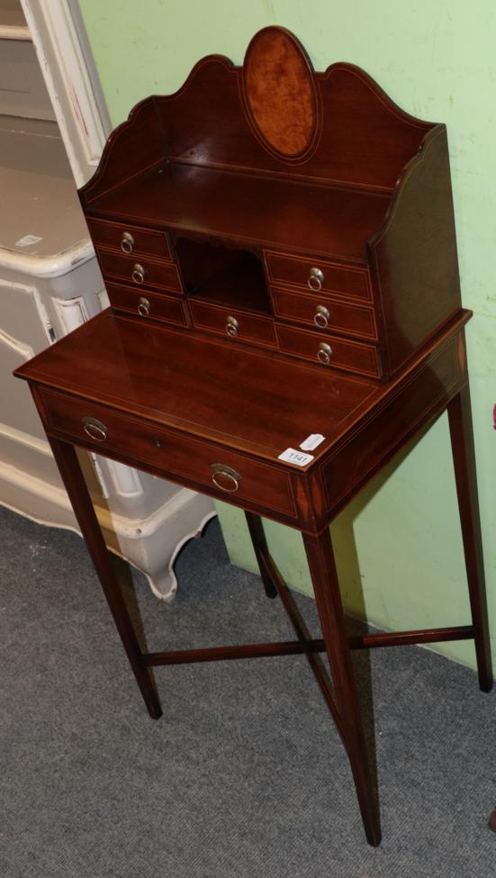 An early 20th century inlaid mahogany ladies desk with super structure back, 50cm wide