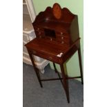 An early 20th century inlaid mahogany ladies desk with super structure back, 50cm wide