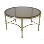 A Late 20th Century Brass and Glass Top Circular Coffee Table, the tinted glass on reeded legs