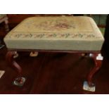 ^ A Victorian mahogany stool with floral needlework cover, 66cm wide