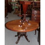 A Victorian inlaid walnut trumpet shaped work table and a Victorian inlaid walnut oval breakfast