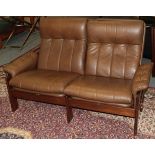 An Ekornes Brown Leather and Stained Beech Reclining Two-Seater Sofa, 147cm by 72cm by 89cm