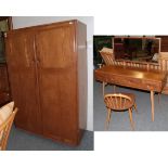 An Ercol Windsor Pattern Double Door Wardrobe, the interior with hanging space, 121cm by 53cm by
