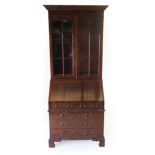 A Reproduction Burr Walnut and Feather Banded Bureau Bookcase, modern, the upper section with glazed