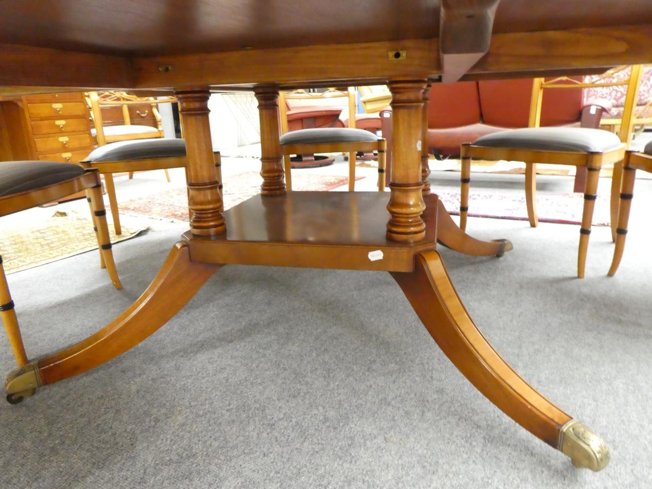 A Reproduction Mahogany Satinwood and Burr Wood Crossbanded Circular Dining Table, in the Regency - Image 2 of 4