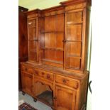 An early 19th century oak farmhouse kitchen dresser with glazed doors, 159cm wide