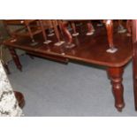 A Victorian mahogany extending dining table circa 1870 with two additional leaves, 254cm extended