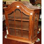 A small glazed oak cupboard, and Victorian oak barometer