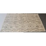 Modernist Moroccan Hand-Knotted Rug, the ivory field of diamond medallions flanked by zigzags, 180cm