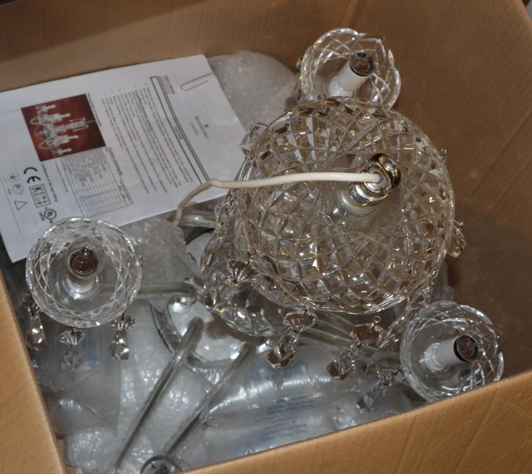 A Waterford crystal nine arm chandelier