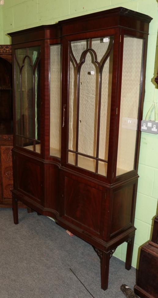 An early 20th century mahogany double door display cabinet