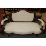 A Victorian two seater sofa, upholstered in cream fabric, 163cm wide