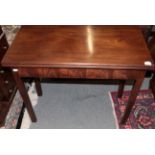 ^ A George III mahogany fold over tea table on square chamfered legs, 91cm