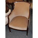 ^ A late 19th century mahogany upholstered armchair with square tapering forelegs, 56cm wide