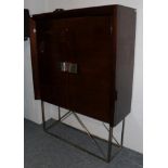 A Polished and Laminated Walnut Double Door Cabinet, modern, with two cupboard doors with chromed