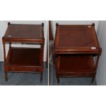 A pair of reproduction mahogany and crossbanded two tier tables, each with a single drawer and