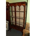 ^ A 1920's walnut display cabinet on shell carved legs, 91cm wide