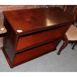 Victorian mahogany bookcase on brass feet