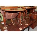 ^ A Victorian walnut kidney shaped occasional table with leather top, 91cm wide; and a Victorian