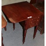 A Victorian mahogany drop leaf work table with three small drawers, 34cm wide