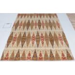 Modern Finely Hand-Knotted Rug of Ikat Design, the cream field of serrated oval panels, 207cm by
