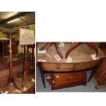 A George III mahogany bow fronted two drawer table, a pole screen, hat stand and an Edwardian