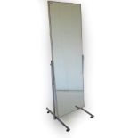 A Late 20th Century Chromed Tubular Cheval Mirror, the rectangular plate with chromed frame pivoting