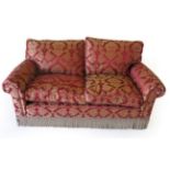 A Good Quality Two-Seater Feather-Filled Sofa, modern, covered in crimson, red and gold fabric, with