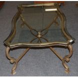 A Glass Top and Gilded Metal Rectangular Coffee Table, modern, of serpentine shaped form with a rope