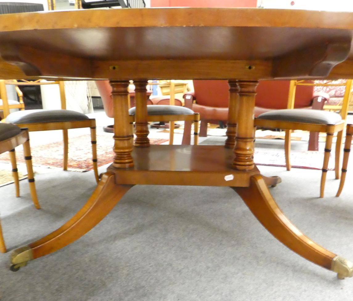 A Reproduction Mahogany Satinwood and Burr Wood Crossbanded Circular Dining Table, in the Regency - Image 4 of 4