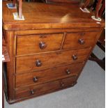 ^ A Victorian mahogany five drawer straight fronted chest of drawers,