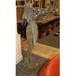 A large figural copper garden water feature in the form of a maiden, 160cm high