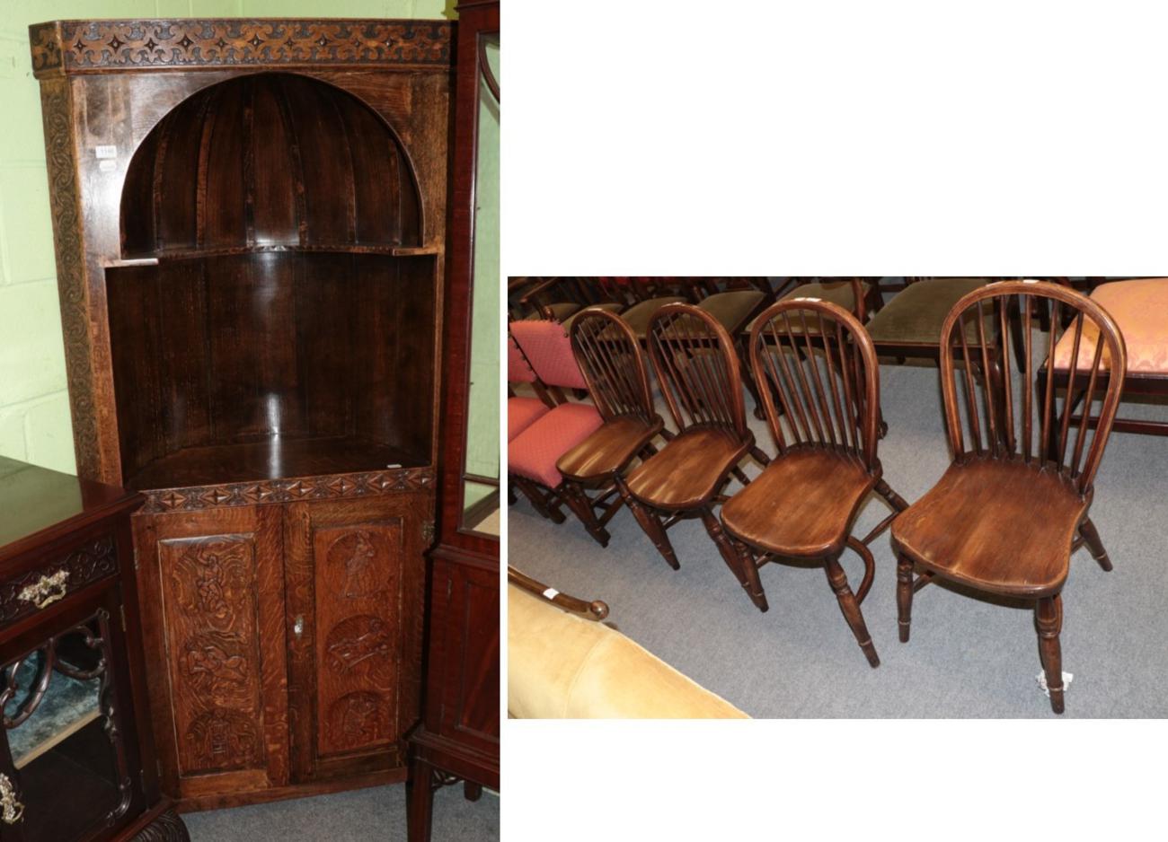 Set of four reproduction oak Windsor dining chairs with crinoline stretchers and a reproduction