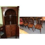 Set of four reproduction oak Windsor dining chairs with crinoline stretchers and a reproduction