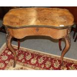 A Victorian burr walnut, kingwood and gilt metal mounted writing table, in Louis XV style, the