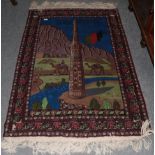 Afghan rug, depicting the Minaret of Jam (Central Afghanistan), enclosed by floral borders, 146cm by