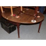 An 18th century pad foot dining table