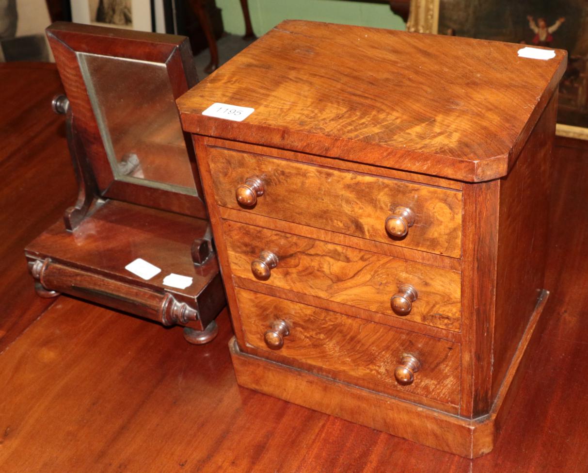 ^ A Victorian figured walnut three drawer miniature chest, 28cm wide; and a Victorian rosewood small