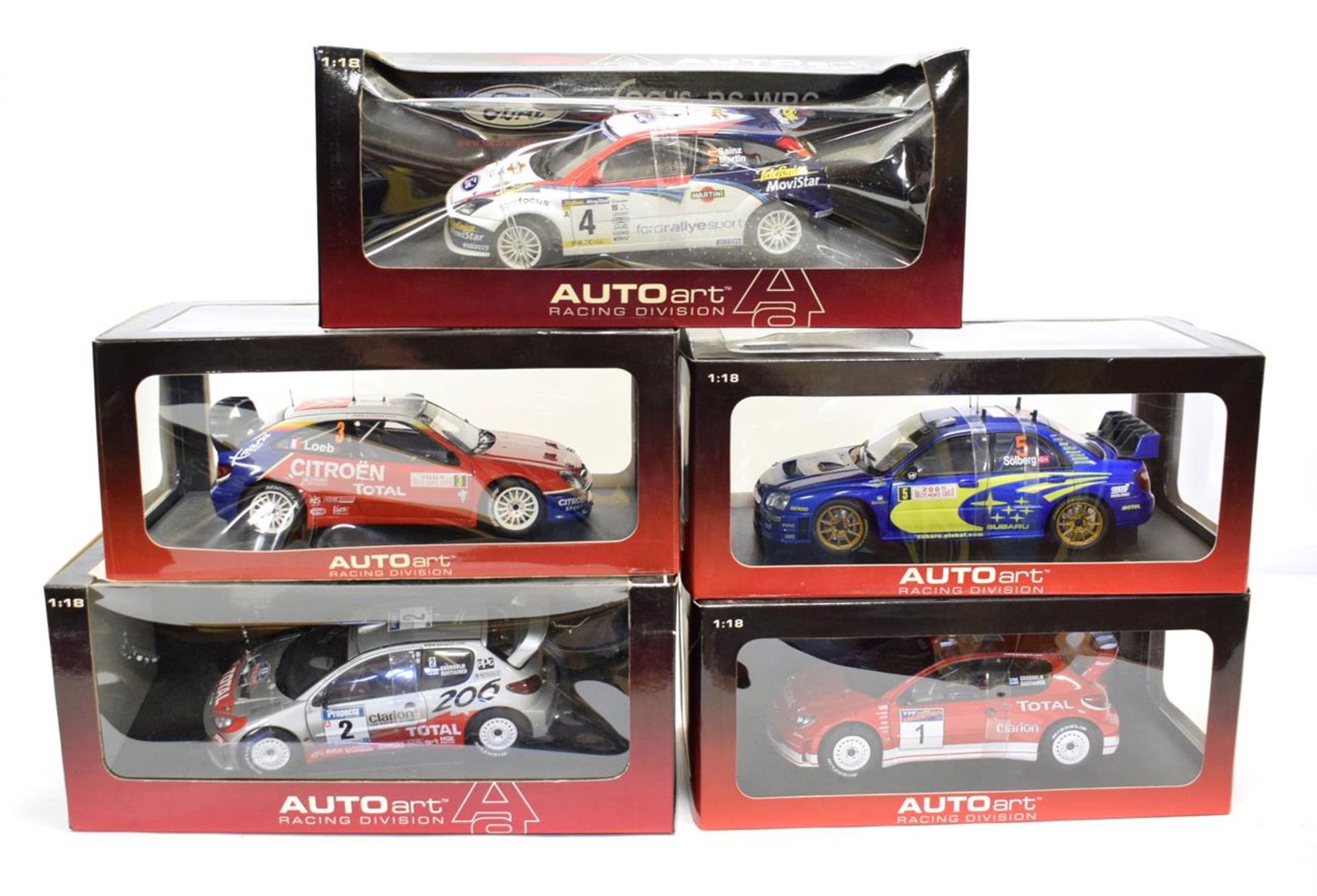 Autoart World Rally Championship Group 1:18 scale models: Ford Focus RS, Peugeot 206, another