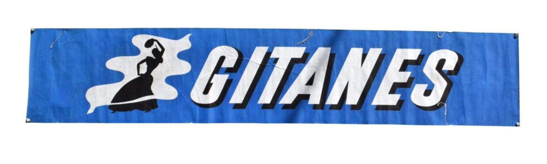 A Fabric Gitanes Advertising Banner, circa 1986, with white and black lettering on a blue ground,