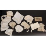 Ten Mainly 19th Century White Cotton Baby Caps and Bonnets, with lace insertions, embroidered