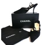 Pair of Chanel Black Suede Pointed Slingback Heeled Shoes, the strap mounted with a small metal '